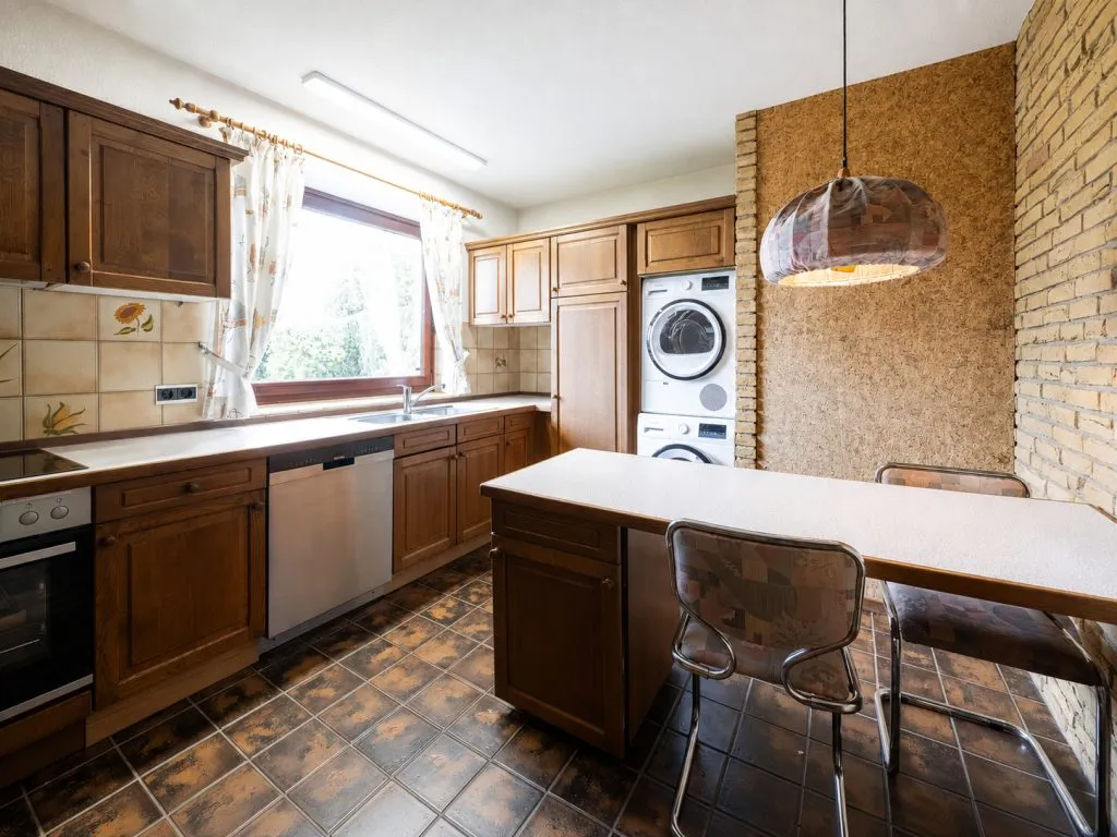 Immobilienangebot - Harrislee - Alle - Harrislee: gepflegter Winkelbungalow mit neuem Dach auf schönem Grundstück