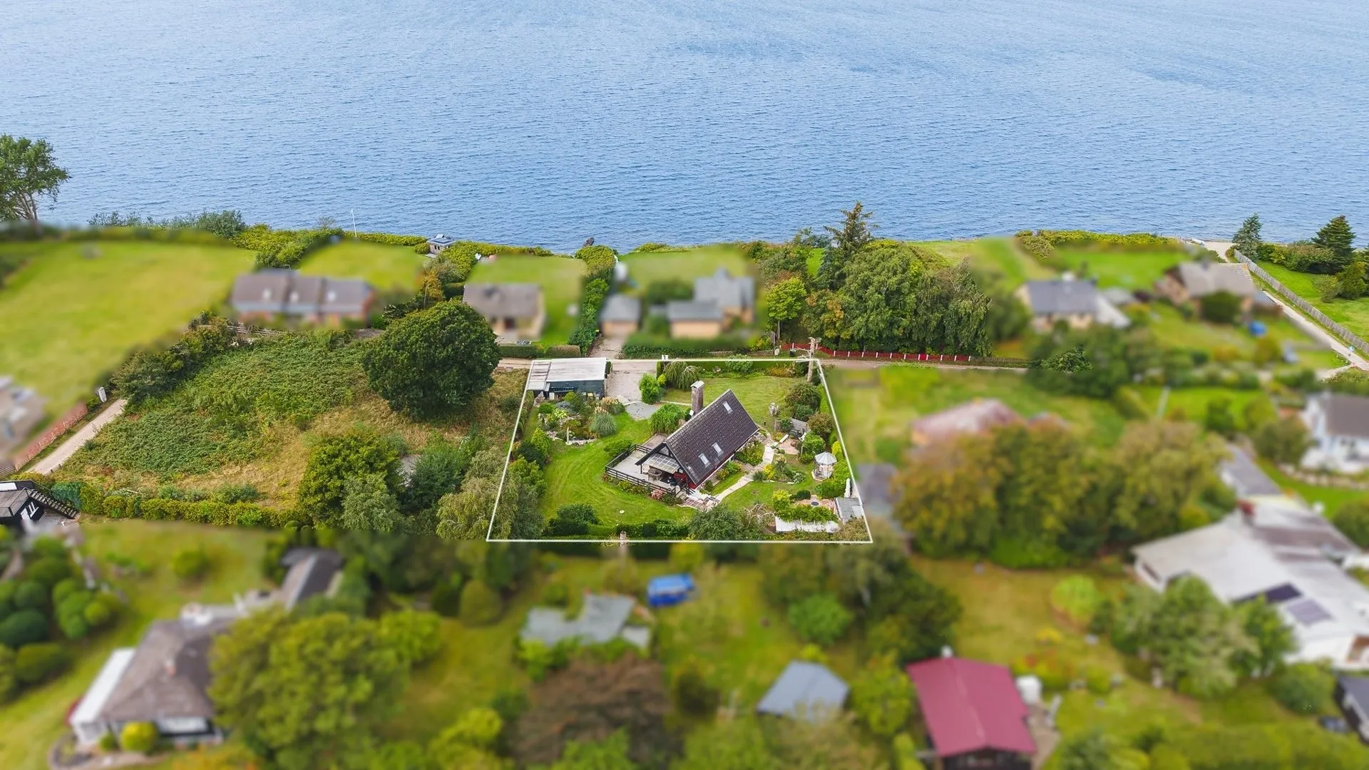 Immobilienangebot - Glücksburg (Ostsee) - Alle - An der Flensburger Förde – außergewöhnliches 1.367 m² Grundstück mit Ferienhaus in begehrter Lage